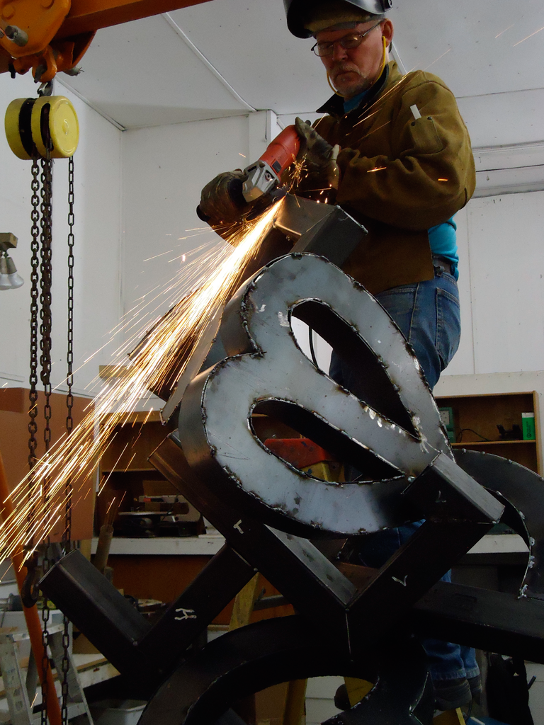 The Artist at Work - sculpture by Peter Mitten - sculpture by Peter Mitten